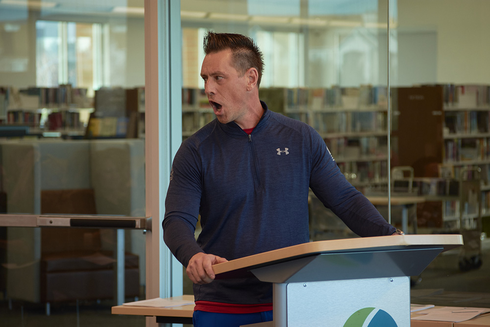 Person yelling at library board meeting
