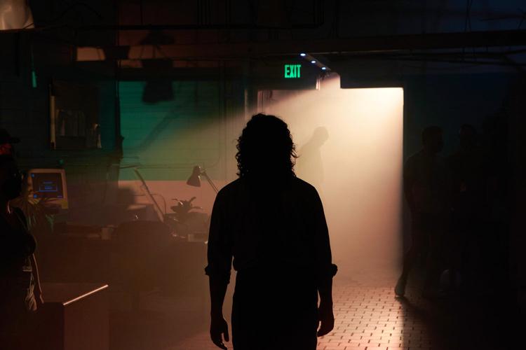 silhouette of man in performative theater